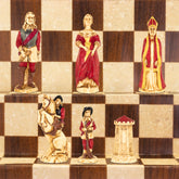 A collection of hand-painted chess pieces depicting characters from the English Civil War, displayed on a chessboard.
During the Middle Ages the King of England ruled and governed with the advice of the great barons of the realm.
This led to a civil war, which determined the fate of how England was to be ruled.
Our Civil War chess set attempts to portray the two opposing sides dressed in the costume of the period.