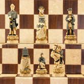 A collection of hand-painted chess pieces based on historical figures from the American Civil War, displayed on a chessboard.