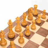 Wooden chess pieces on a wooden chessboard