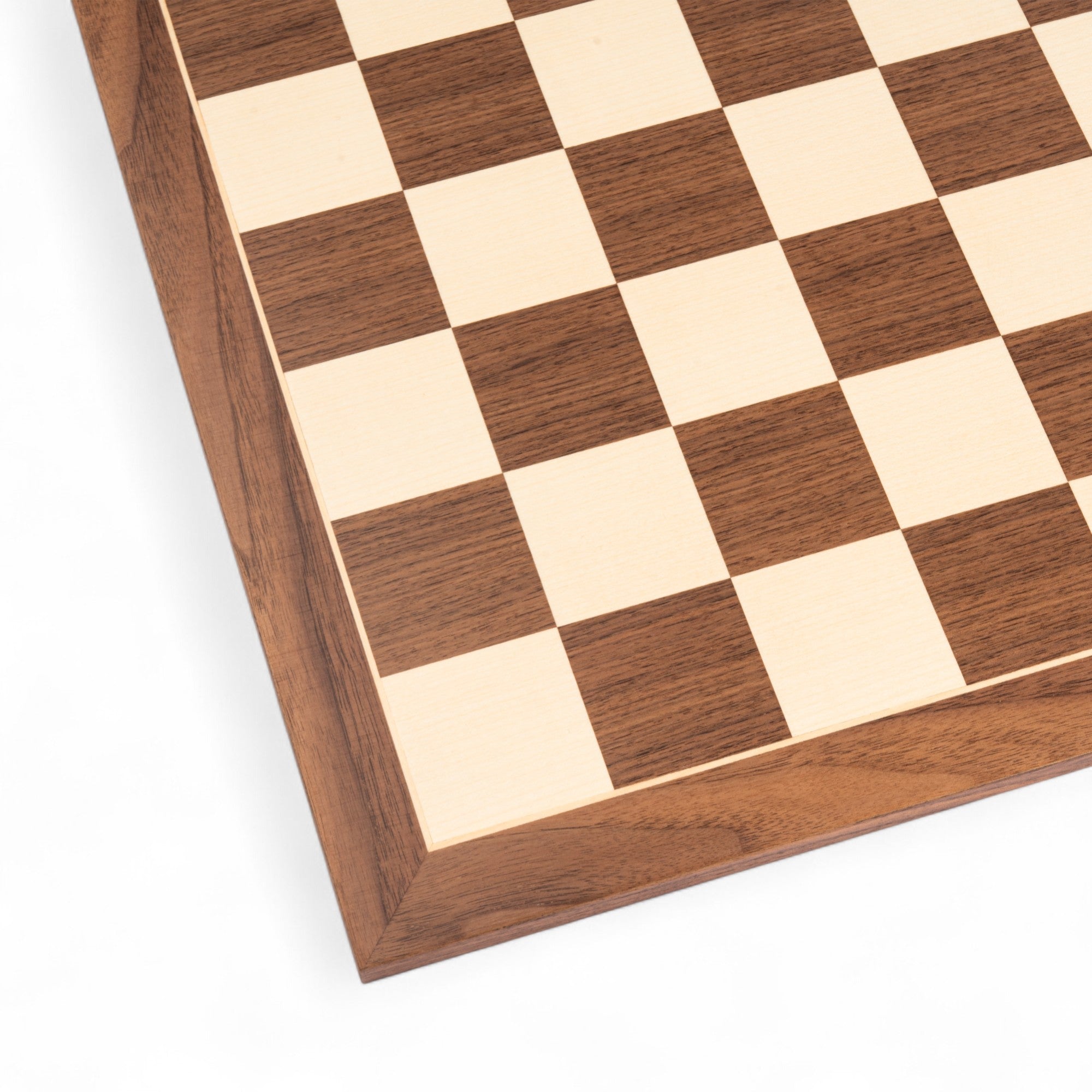 Wooden chessboard with checkered pattern on a white background