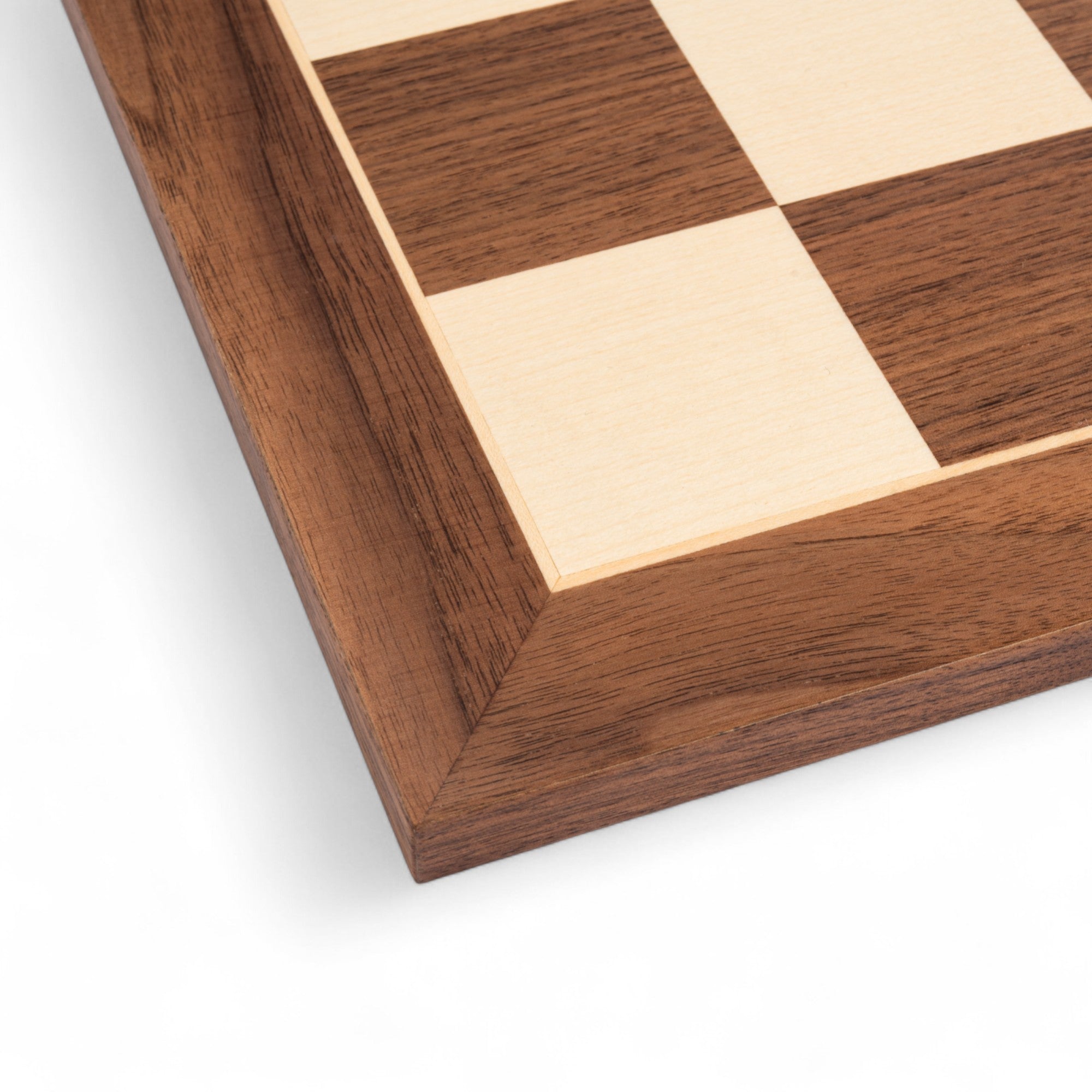 Wooden chessboard with checkered pattern on a white background