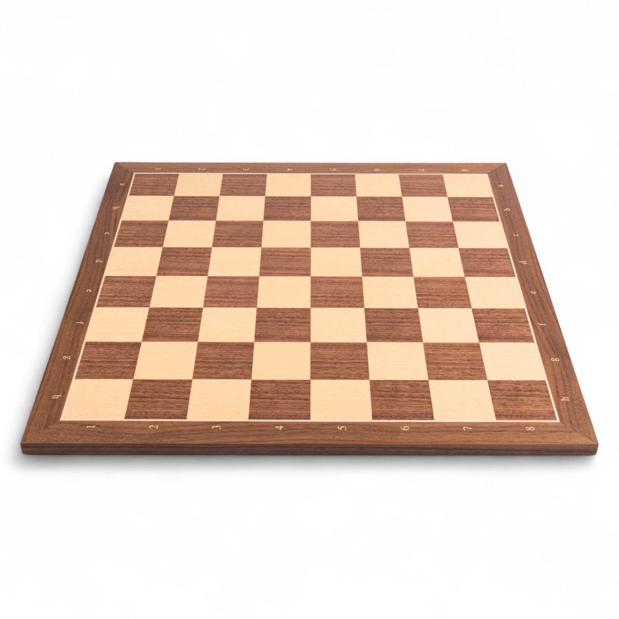 Wooden chess board with checkered pattern on a white background