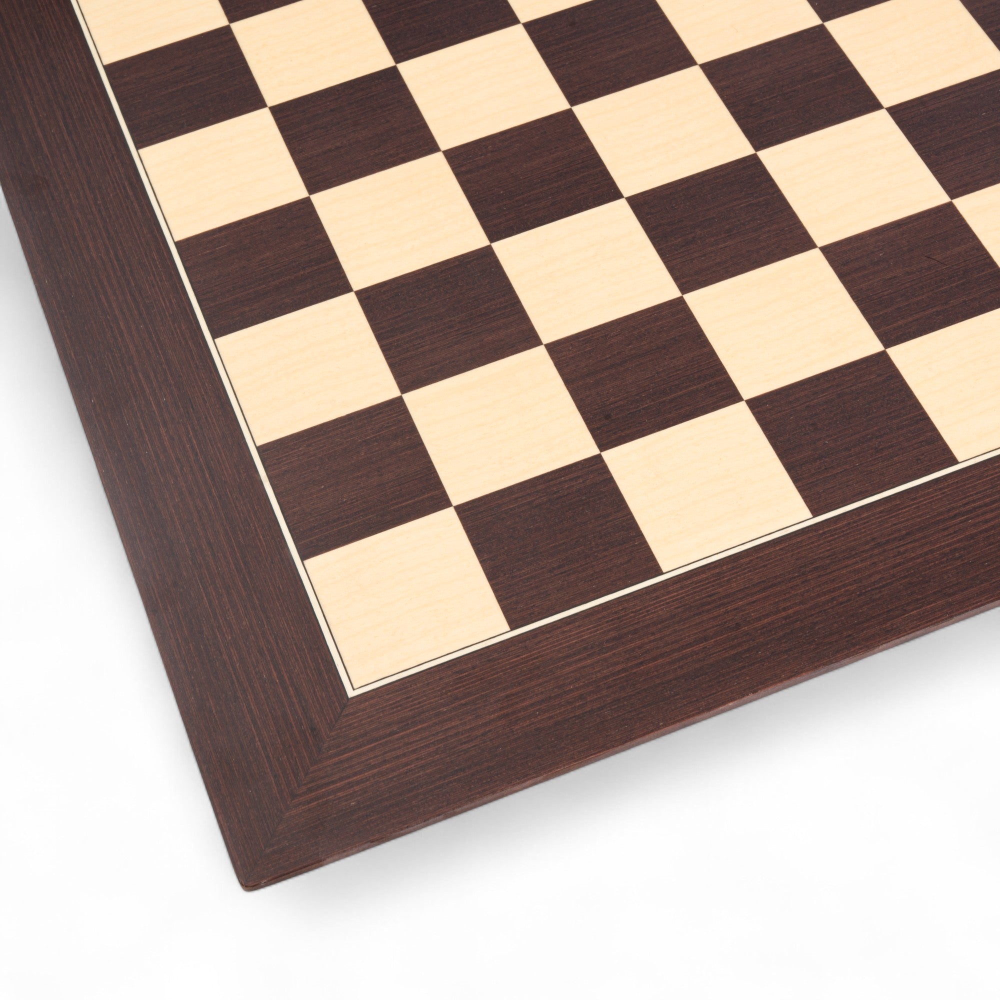 Close-up of a wooden chessboard with checkered pattern