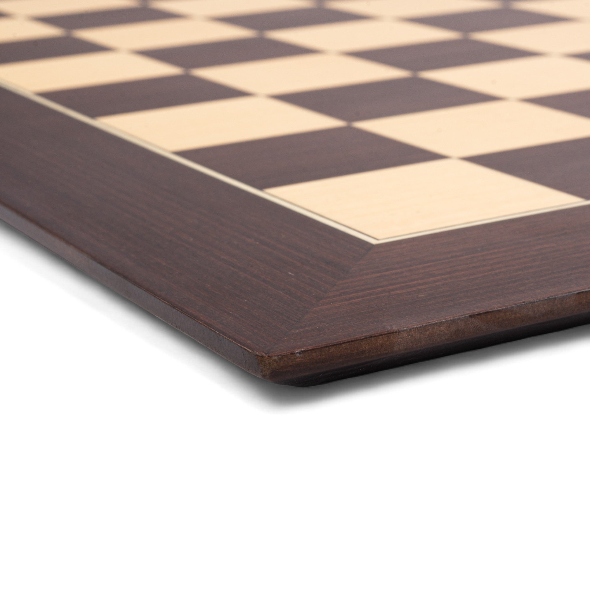 Close-up of a wooden chessboard with checkered pattern