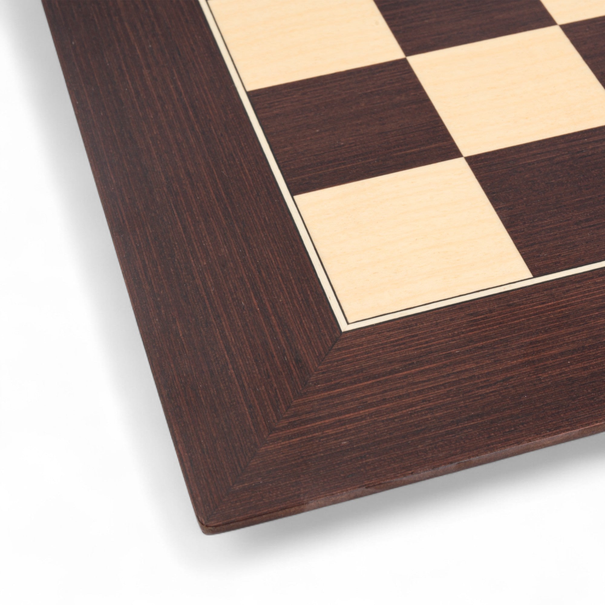 Close-up of a wooden chessboard with checkered pattern