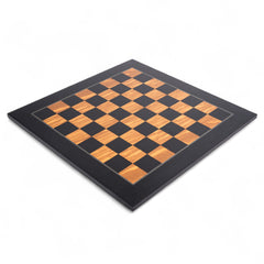 Wooden chessboard with black border on a white background