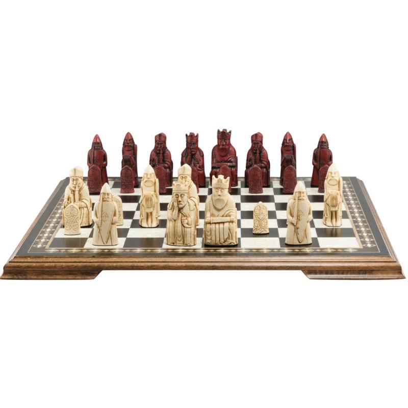 A handmade recreation of The Isle of Lewis Chess Set, the oldest known chess set.

In 1831 the sea carried away a sandbank on the Isle of Lewis uncovering a mysterious building that had been buried under the sand. A peasant working nearby found what he concluded to be a collection of Elves and Gnomes. The superstitious highlander flung down his spade and fled home in horror.