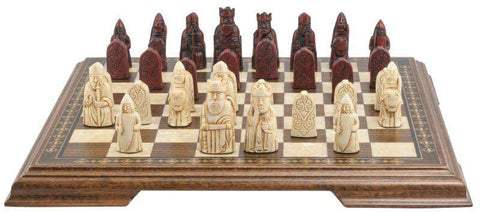 A miniature chess set inspired by the Isle of Lewis chessmen, the oldest known chess set.

In 1831 the sea carried away a sandbank on the Isle of Lewis uncovering a mysterious building that had been buried under the sand. A peasant working nearby found what he concluded to be a collection of Elves and Gnomes. The superstitious highlander flung down his spade and fled home in horror.