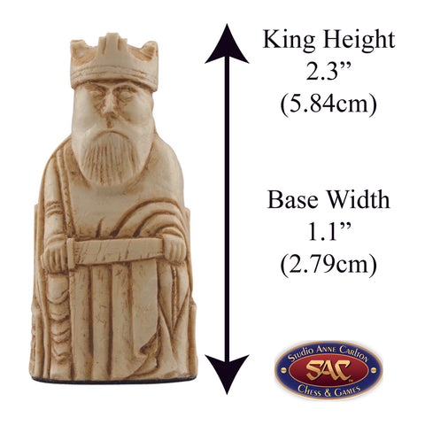 A handmade chess piece from the Isle of Lewis set, Alongside measurement information.

In 1831 the sea carried away a sandbank on the Isle of Lewis uncovering a mysterious building that had been buried under the sand. A peasant working nearby found what he concluded to be a collection of Elves and Gnomes. The superstitious highlander flung down his spade and fled home in horror.

