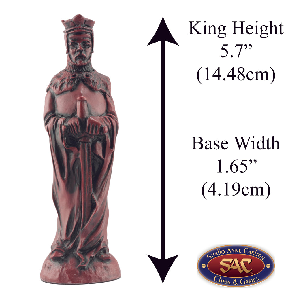 A handmade burgundy coloured chess piece depicting King Arthur, From Arthurian Legend, Alongside measurement information.