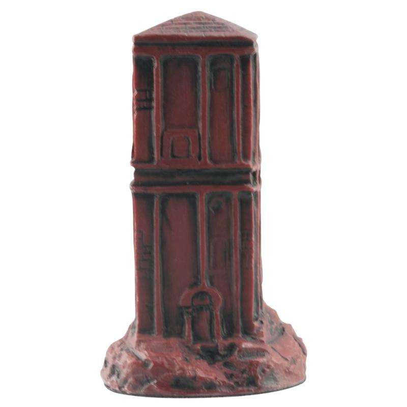 A handmade burgundy coloured chess piece depicting the Castle of Camelot, From Arthurian Legend.