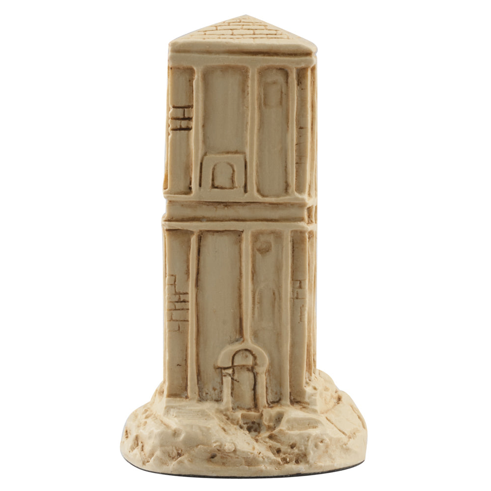 A handmade ivory coloured chess piece depicting the Castle of Camelot, From Arthurian Legend.