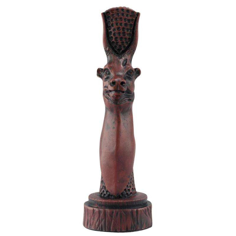 A handmade chess piece depicting Hesat, the ancient goddess often depicted as a cow, embodying nourishment, fertility and motherhood.