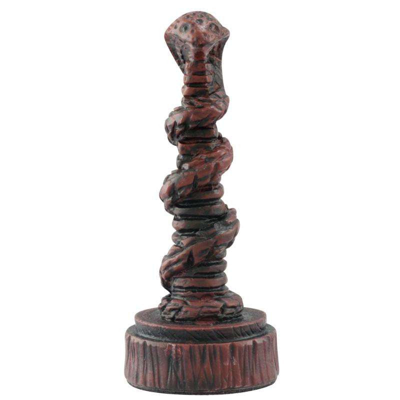 A handmade chess piece depicting a Cobra statue, the symbol of one of the earliest Egyptian deities, the goddess Wadjet, the spitting cobra, or the Uraeus also came to symbolize royalty and divinity.