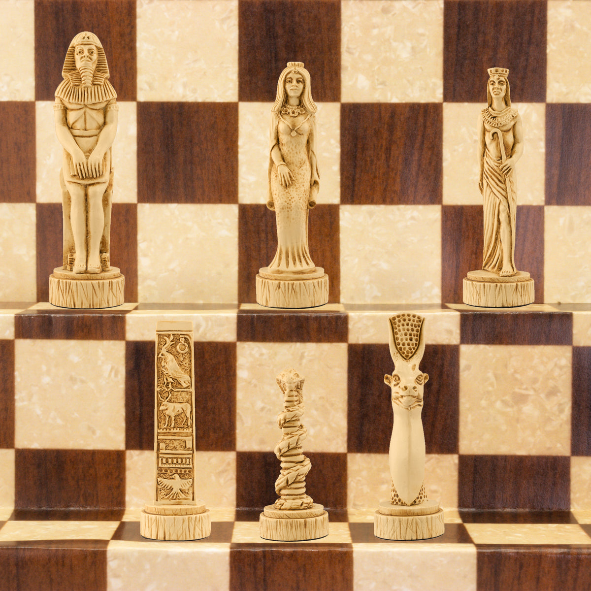A chess set with pieces featuring ancient Egyptian motifs and figures, placed on a chess board.

This beautiful chess set depicts figures from the civilisation of Ancient Egypt, a society which began around
3150BC, growing rapidly along the  banks of the River Nile. Trade with other countries and its agricultural security helped it to become enormously prosperous; and due to this great wealth the rulers, known as Pharaohs, were very powerful, as were its priests.