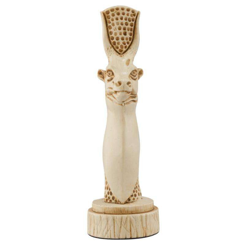 A handmade chess piece depicting Hesat, the ancient goddess often depicted as a cow, embodying nourishment, fertility and motherhood.