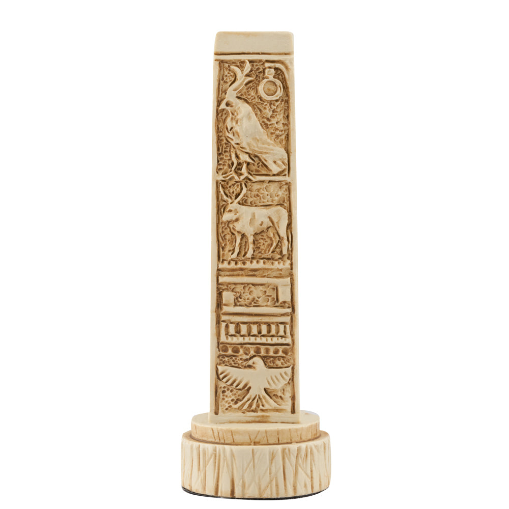 A handmade chess piece depicting an Egyptian obelisk, these symbolised the Sun God Ra and the Ancient Egyptians placed them in pairs at the
entrance to their temples.