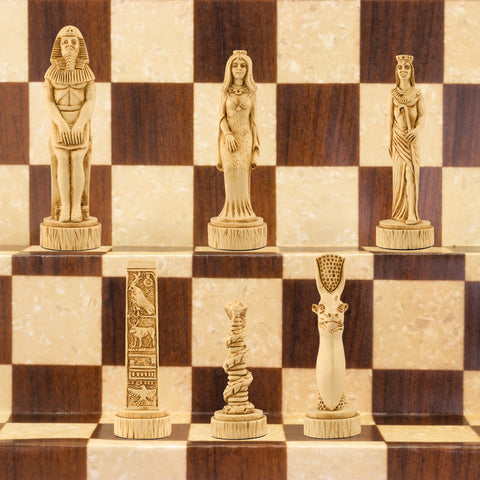 A chess set with pieces featuring ancient Egyptian motifs and figures, placed on a chess board.

This beautiful chess set depicts figures from the civilisation of Ancient Egypt, a society which began around
3150BC, growing rapidly along the  banks of the River Nile. Trade with other countries and its agricultural security helped it to become enormously prosperous; and due to this great wealth the rulers, known as Pharaohs, were very powerful, as were its priests.