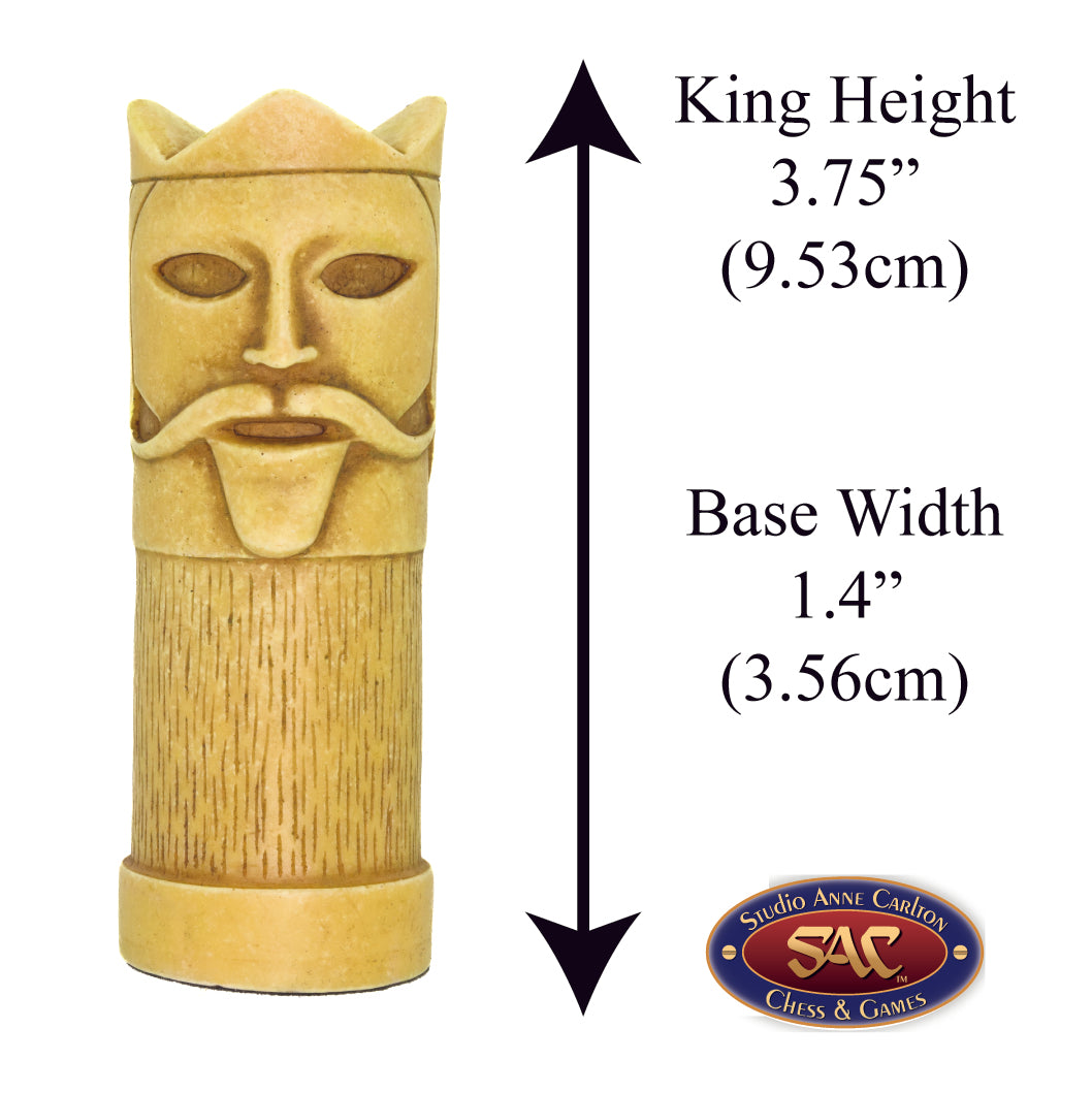 A hand made ivory coloured King chess piece inspired by a fusion of traditional staunton chess piece design and medieval masquerades.

Alongside measurement information.