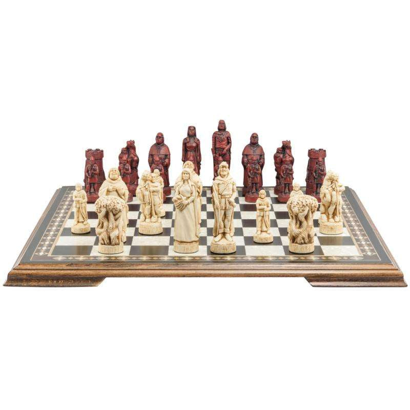 Hand made themed chess set, inspired by the legend surrounding Robin Hood. One side contains Robin Hood as the King, Maid Marian as the Queen, Friar Tuck as the Bishop, Will Scarlet as the Knight, A Sherwood Tree as the Rook & The Merry Men as the Pawn pieces. The other side contains The Sherrif of Nottingham as the King, a prioress as the Queen, The Abbot of St Mary's as the Bishop, Sir Guy as the Knight, The Keep of Nottingham Castle as the Rook, and Soldiers of the Sherrif as the pawns.
