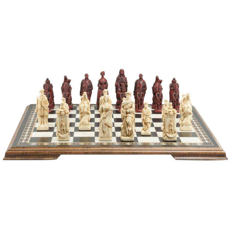 A handmade chess set depicting figures from the Battle of Culloden, with pieces in ivory and burgundy colours, placed on a chess board.