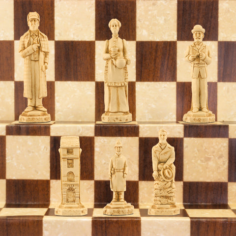 Ivory coloured themed chess pieces depicting Sherlock Holmes, Mrs Hudson, Doctor Watson, Inspector Lestrade, 221b Baker Street & Victorian Police Constables.
Atop a brown and white chess board.
