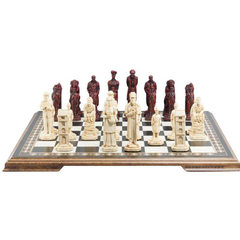 Ivory and Burgundy colour chess set featuring characters resembling Sherlock Holmes and other figures, placed on a wooden chessboard.
