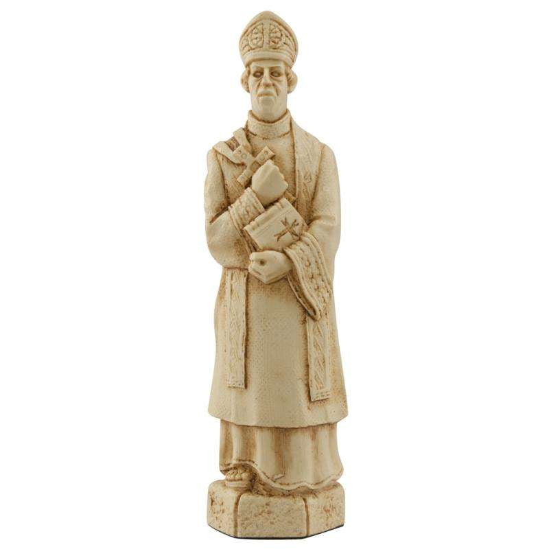 A handmade chess piece depicting a Christian Bishop in typical garments suitable for the period.
