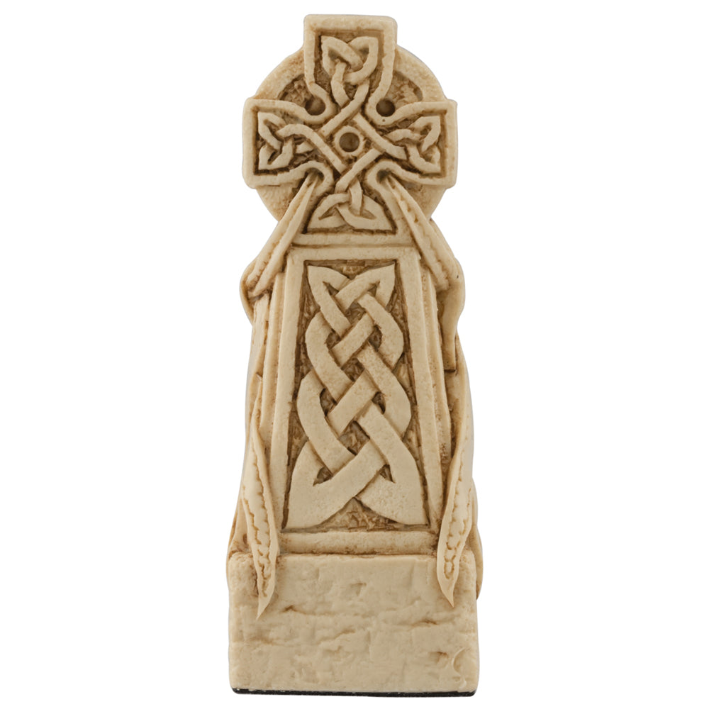 A handmade chess piece featuring a Celtic Cross.
