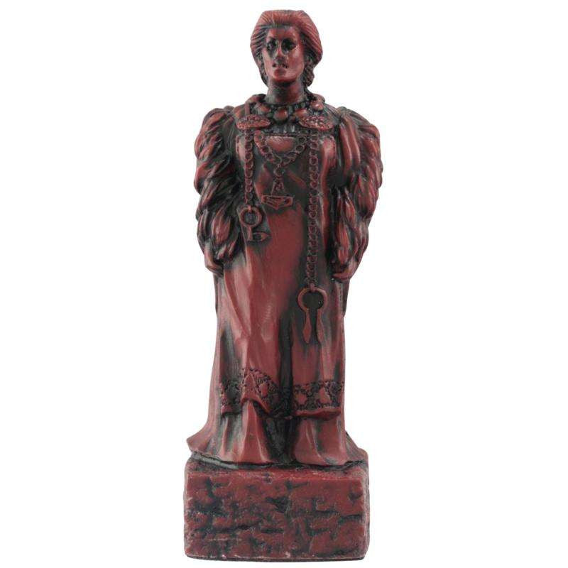A handmade chess piece featuring a Viking Noblewoman.