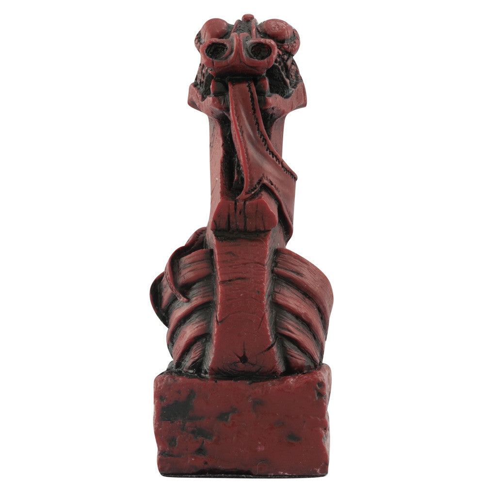 A handmade chess piece featuring a Viking Longship.