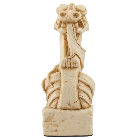 A handmade chess piece featuring a Viking Longship.
