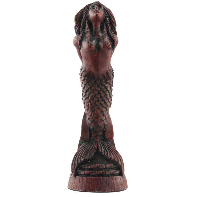 A hand made burgundy coloured Queen chess piece depicting a Mermaid, inspired by the mythical sirens of the sea.
