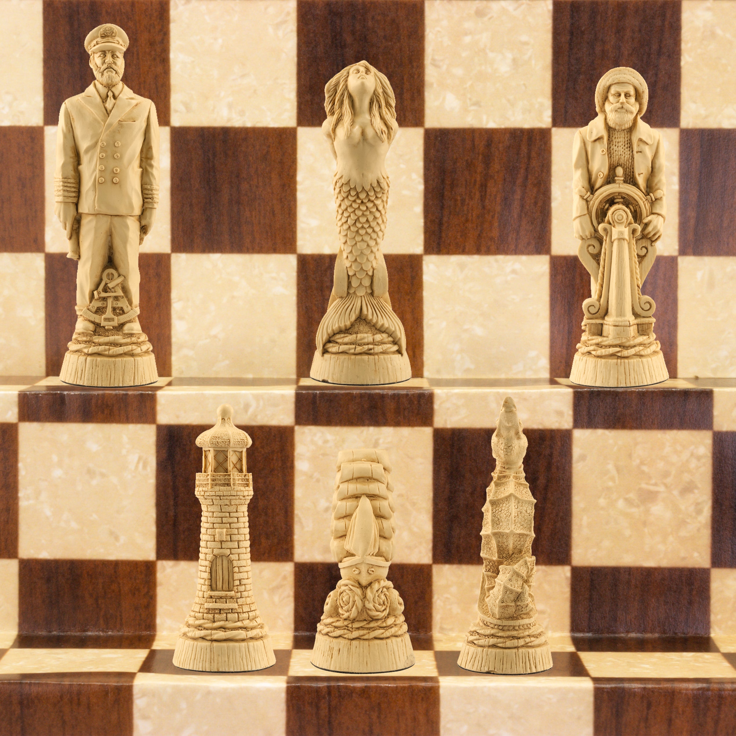 The ivory coloured side of a nautical-themed chess set with pieces including a Captain, Mermaid, Navigator, Seahorse, Lighthouse, and Ship, displayed on a brown and beige chess board.