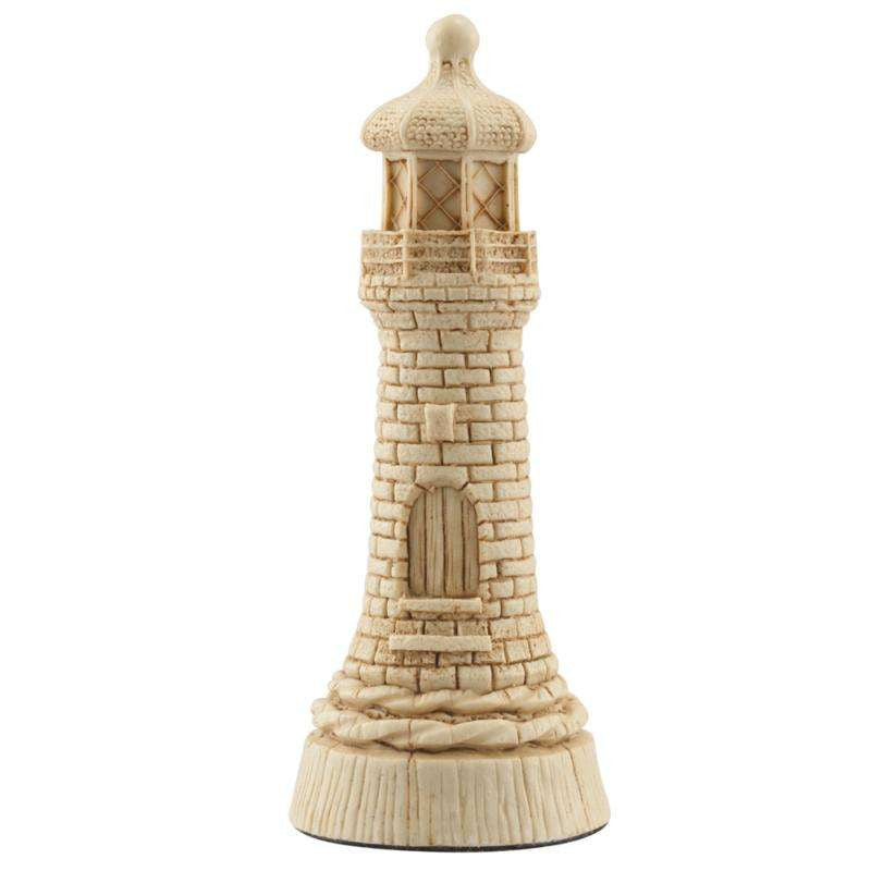 A hand made ivory coloured Rook chess piece depicting a LightHouse, built to warn sailors of the proximity of rocks through thick fog and sea mist.