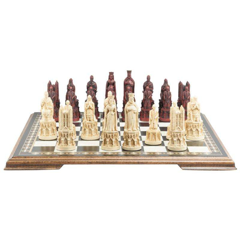 A hand made chess set inspired by the architecture and statuary in and around Medieval Cathedrals, placed on a chess board.

A chess set of gracious proportions and great detail.
