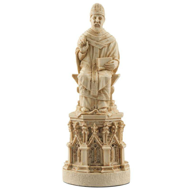 A handmade ivory coloured chess piece depicting a Bishop or Archbishop, seated on the Bishops Throne.
