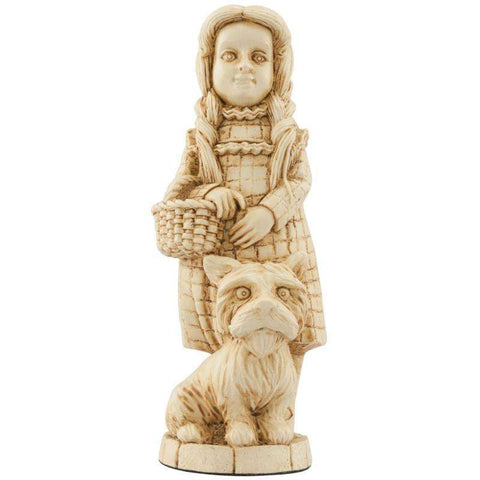 Ivory coloured themed Queen chess piece Depicting Dorothy from the Wonderful Wizard of Oz, with a wicker basket and Toto, her faithful companion.