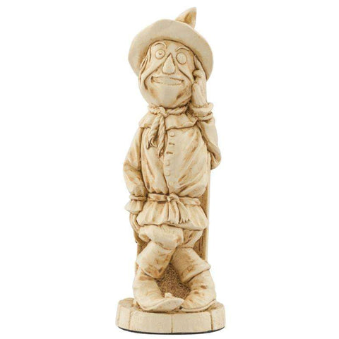 Ivory coloured themed Bishop chess piece Depicting The Scarecrow from the Wonderful Wizard of Oz, in a pose scratching his head.