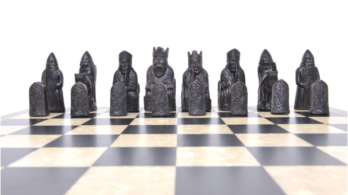 A handmade recreation of The Isle of Lewis Chess Set, the oldest known chess set.

In 1831 the sea carried away a sandbank on the Isle of Lewis uncovering a mysterious building that had been buried under the sand. A peasant working nearby found what he concluded to be a collection of Elves and Gnomes. The superstitious highlander flung down his spade and fled home in horror.