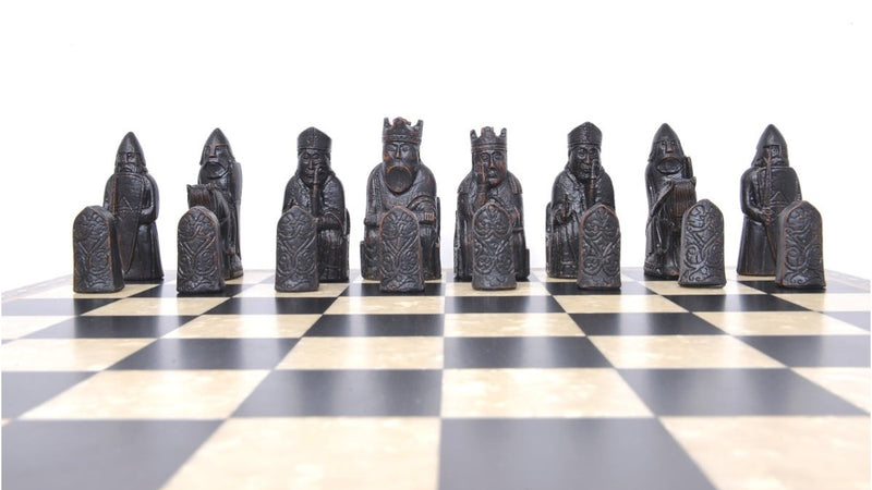 A handmade recreation of The Isle of Lewis Chess Set, the oldest known chess set.

In 1831 the sea carried away a sandbank on the Isle of Lewis uncovering a mysterious building that had been buried under the sand. A peasant working nearby found what he concluded to be a collection of Elves and Gnomes. The superstitious highlander flung down his spade and fled home in horror.