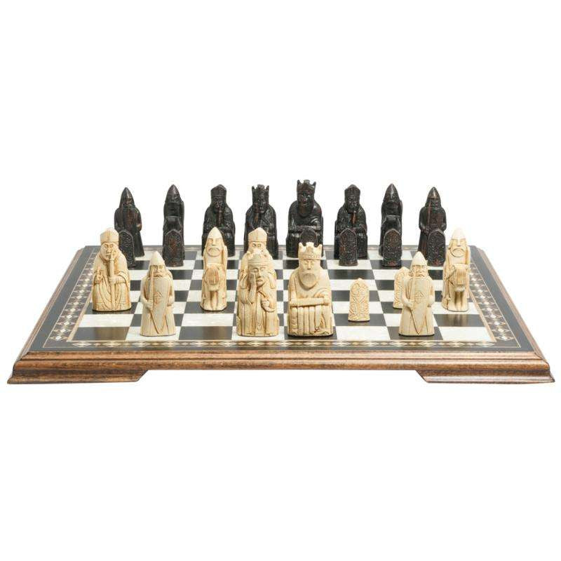 A handmade recreation of The Isle of Lewis Chess Set, the oldest known chess set.

In 1831 the sea carried away a sandbank on the Isle of Lewis uncovering a mysterious building that had been buried under the sand. A peasant working nearby found what he concluded to be a collection of Elves and Gnomes. The superstitious highlander flung down his spade and fled home in horror.