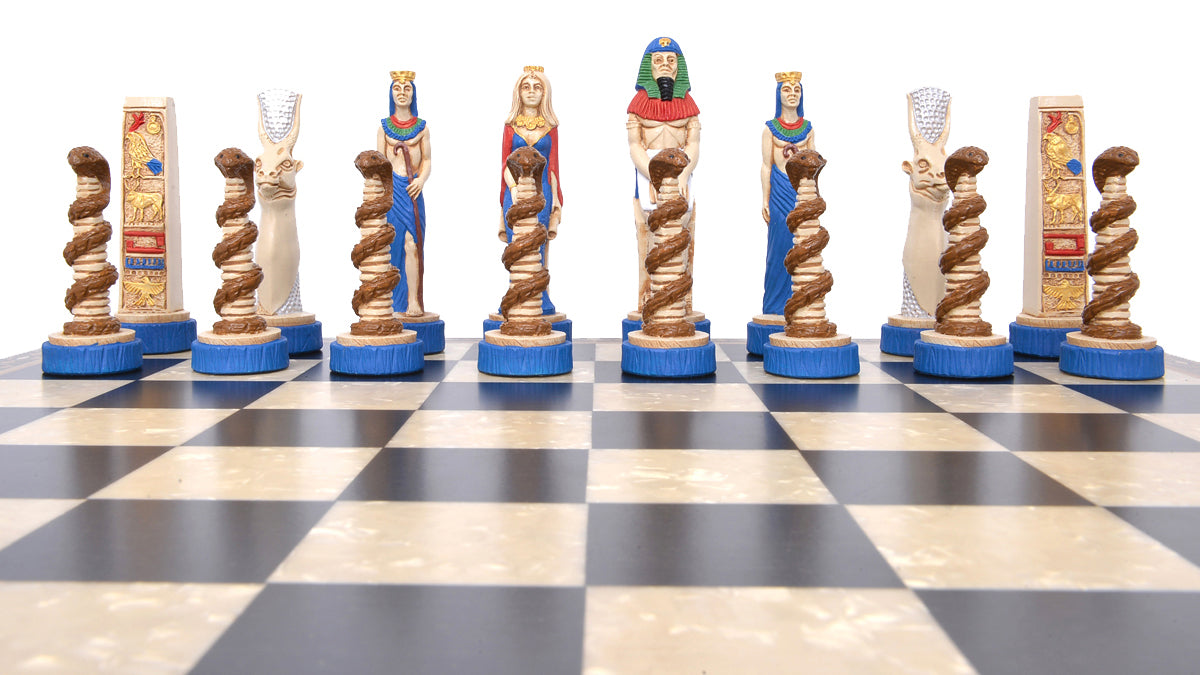 The blue side of a chess set with pieces featuring ancient Egyptian motifs and figures, placed on a chess board.

This beautiful chess set depicts figures from the civilisation of Ancient Egypt, a society which began around
3150BC, growing rapidly along the  banks of the River Nile. Trade with other countries and its agricultural security helped it to become enormously prosperous; and due to this great wealth the rulers, known as Pharaohs, were very powerful, as were its priests.