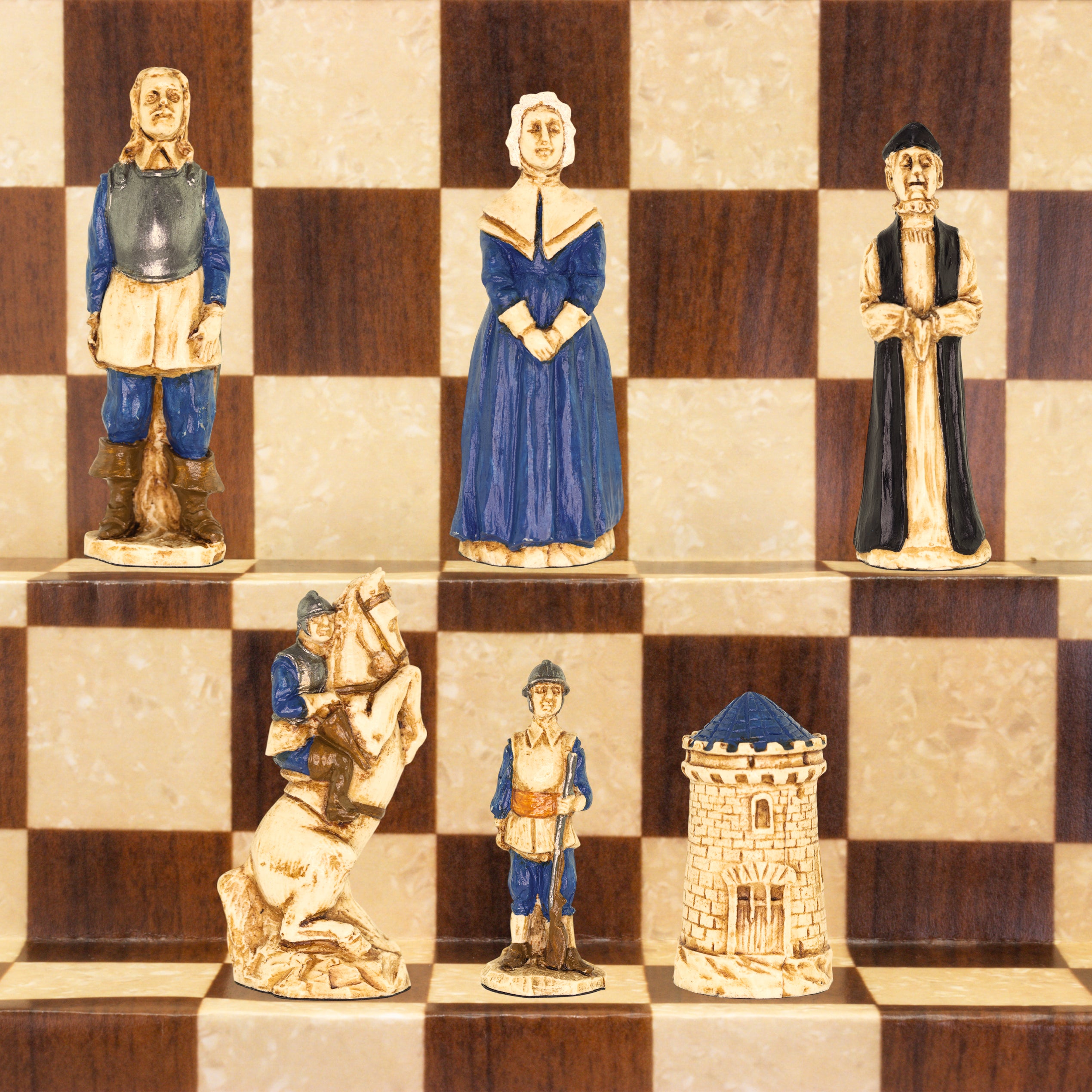 A collection of hand-painted chess pieces depicting characters from the English Civil War, displayed on a chessboard.

During the Middle Ages the King of England ruled and governed with the advice of the great barons of the realm.

This led to a civil war, which determined the fate of how England was to be ruled.

Our Civil War chess set attempts to portray the two opposing sides dressed in the costume of the period. 

