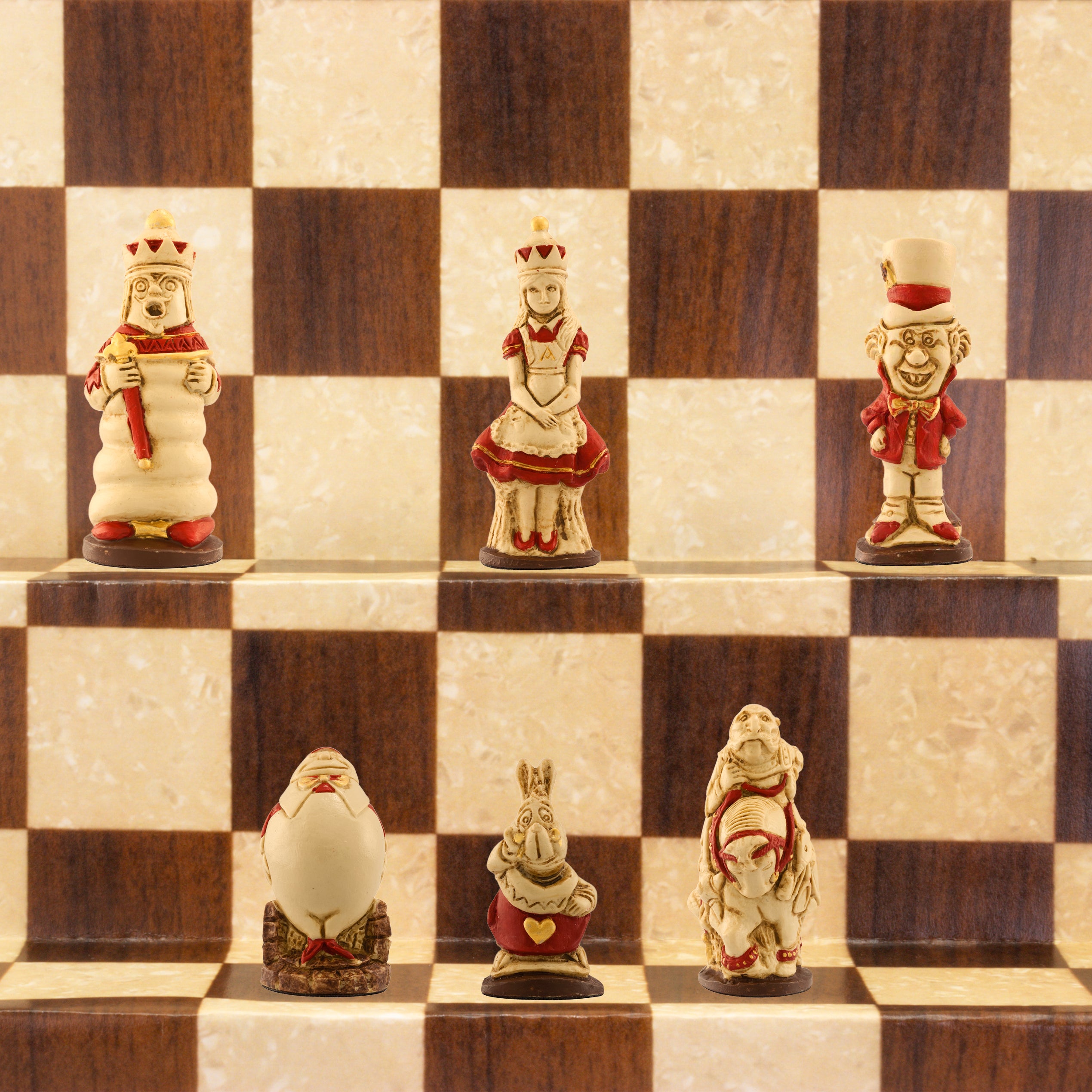 A handmade chess set featuring characters from Alice in Wonderland, placed on a checkered background.