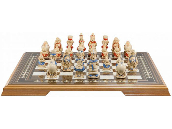 A handmade chess set featuring characters from Alice in Wonderland, placed on a chess board.