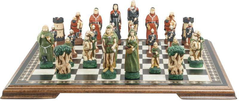 Hand painted themed chess set, inspired by the legend surrounding Robin Hood. One side contains Robin Hood as the King, Maid Marian as the Queen, Friar Tuck as the Bishop, Will Scarlet as the Knight, A Sherwood Tree as the Rook & The Merry Men as the Pawn pieces. The other side contains The Sherrif of Nottingham as the King, a prioress as the Queen, The Abbot of St Mary's as the Bishop, Sir Guy as the Knight, The Keep of Nottingham Castle as the Rook, and Soldiers of the Sherrif as the pawns.