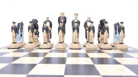 A low angle shot of The Moriarty side of a hand-painted chess set featuring Moriarty, Irene Adler, Colonel Moran, The Hound of The Baskervilles, Rechenbach Falls & Victorian Loafers. Atop a Black and White Chessboard.