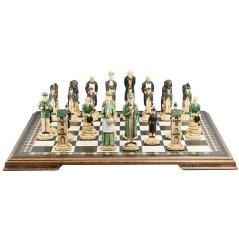 Hand painted chess set featuring characters resembling Sherlock Holmes and other figures, placed on a wooden chessboard.