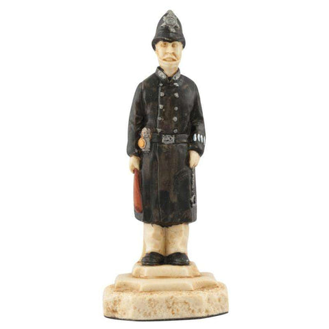 Hand painted themed Pawn chess piece depicting a Bobbie or police constable of the Metropolitan Police force based at Scotland Yard in London.